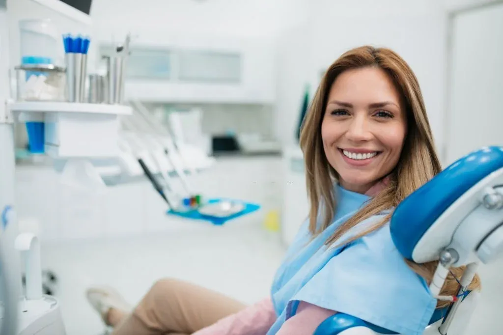 Surgical tooth removal — patient in dental chair